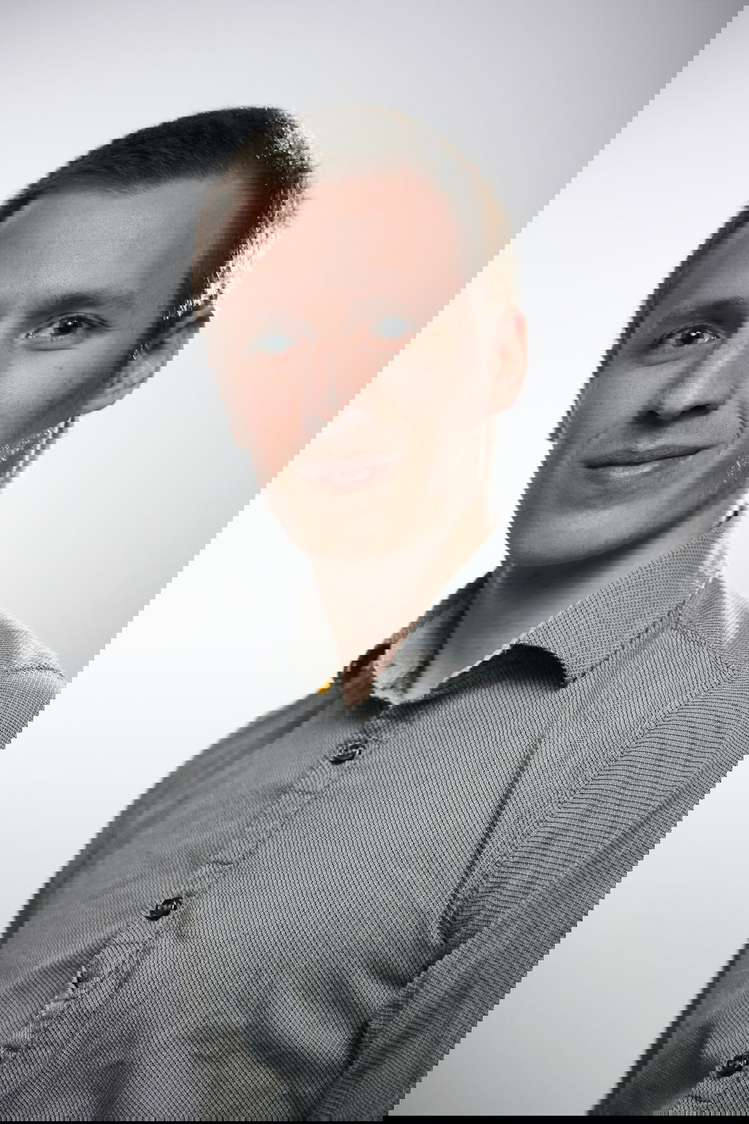 man in gray button up shirt